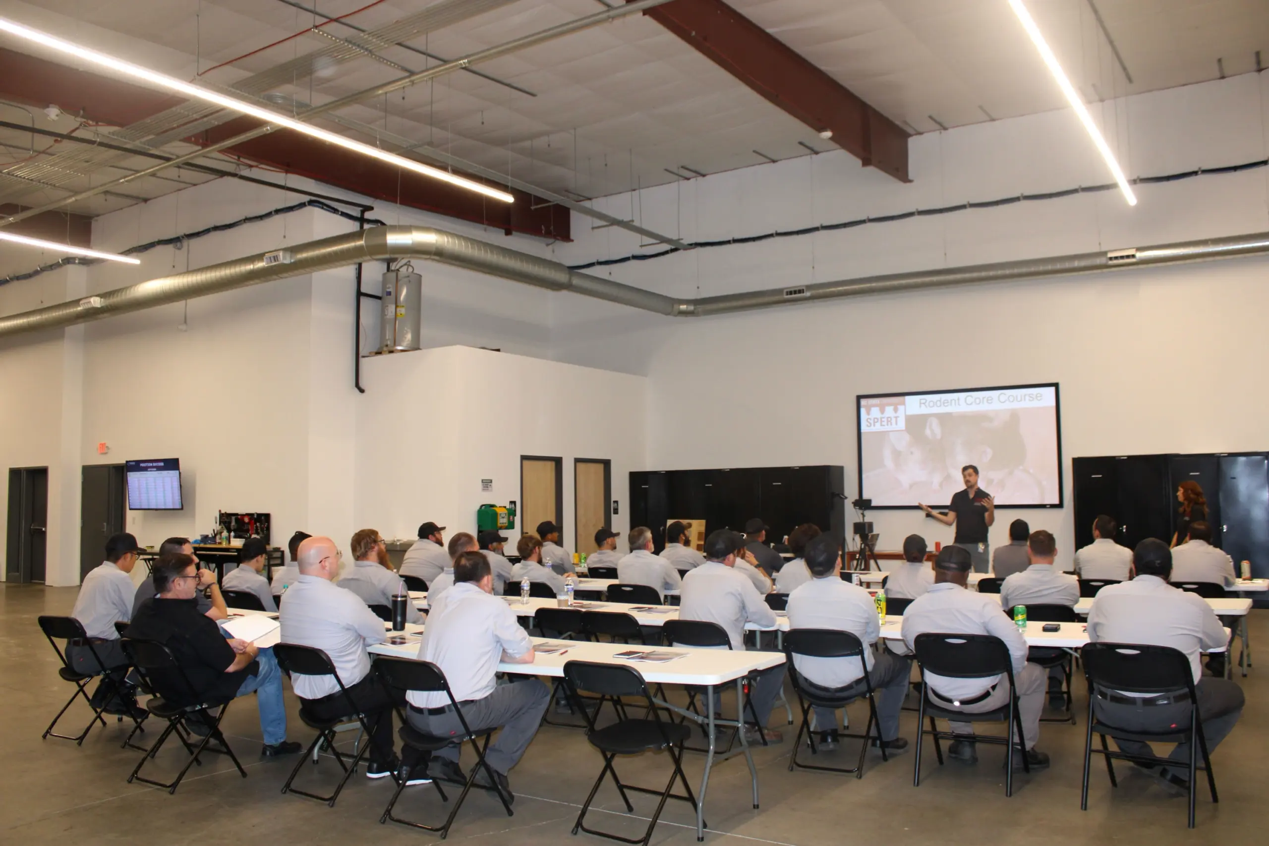 NC State University SPERT program instructors leading a structural pest training seminar for Triangle Pest Control specialists