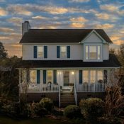 Charlotte home in late fall with winter lighting, representing hidden winter pest activity inside homes.